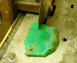 Photo of sawing a slab of Chrysoprase with my trim saw.