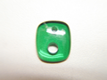 Photo of a cushion shape green stone with 2 holes of different sizes.