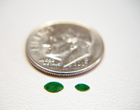 2 tiny marquise shaped green Jadeite cabochons.