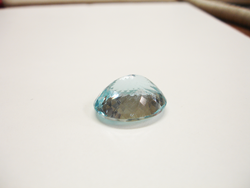 Photo of an oval Aquamarine face down