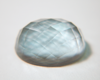 Picture of a faceted cabochoon.