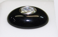 Oval black Onyx drilled for a countersunk Diamond
