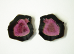 Photo of 2 small watermelon Tourmaline which we drilled small holes in the top.