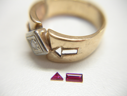 Shows the finished tiny Rubies sitting next to the ring they will be mounted into.