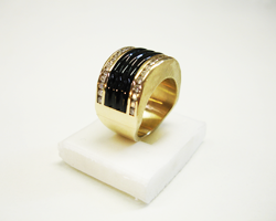 Shows the finished ring with the black jade inlay which has grooves carved into it.