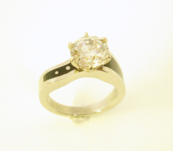 Photo shows the finished ring with the Diamond in place.