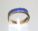 A simple arching inlay of Lapis in a ring.