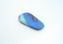 The boulder Opal has now been recut and repaired and the left side is smooth and polished.