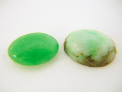 2 green Jadeite cabochons which are scratched and dull.
