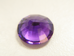 Shows the finished oval Amethyst which has been repaired.
