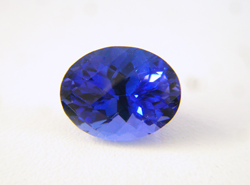 Shows the top of the oval Tanzanite which I repaired and it is very beautiful.
