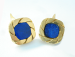 Photo of a pair of cufflinks with Lapis inlays. The one on the right is broken.