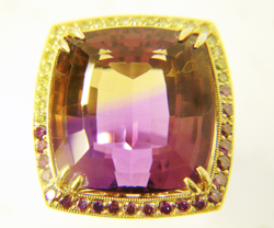 Shows the Ametrine after the table has been re-polished.