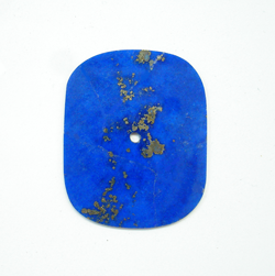 A rectangular Lapis watch dial which has rounded corners.