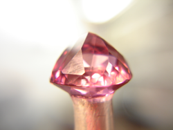 A photo of the same pink Tourmaline during the re-faceting process.