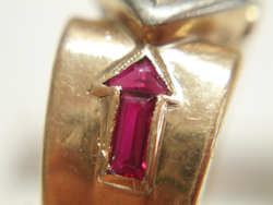 Two photos showing close up shots of the chipped Rubies.