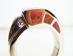 Side view of ring with 9 Jasper inlays.