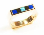 Ring with Opal, Lapis, and Onyx composite inlays.