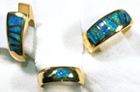 3 rings inlaid with 15 Opal inlays.