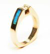 A simple ring with a long Opal inlay going down each side.