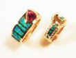 2 rings inlaid with Opals. One has a pink Tourmaline set in it.