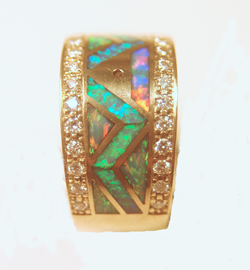A ring with many small Opal inlays. The center row has a zig zag pattern.