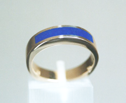 Ring inlaid with blue Lapis across the top.