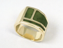 Ring inlaid with green Nephrite Jade.