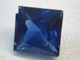Small photo of a facetedSapphire with a chip.